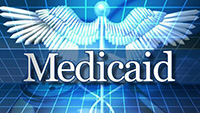The image displays a logo with the word  MEDICAID  prominently featured against a background that includes a stylized eagle s head, medical-related symbols, and a digital interface with the word  Medicare  in a smaller font.